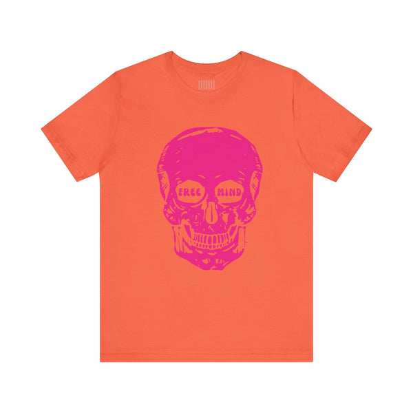 Orange festival-style tee with jumbo pink skull graphic and "FREE MIND" text in eye sockets