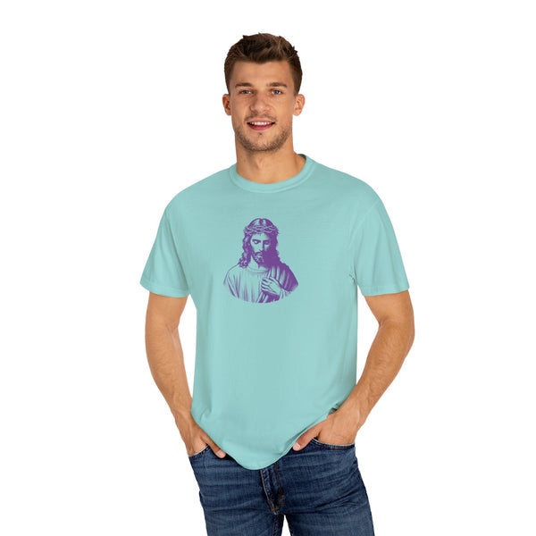 Man wearing light blue christ t shirt with bold purple Jesus graphic on chest, casual fit and short sleeves