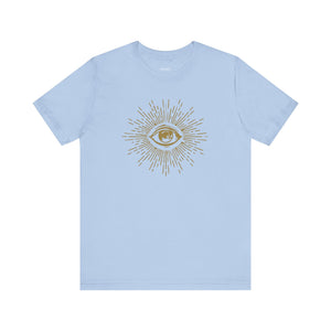 Light blue unisex tee shirt with a gold third eye graphic surrounded by radiant rays symbolizing spiritual awareness and intuition.