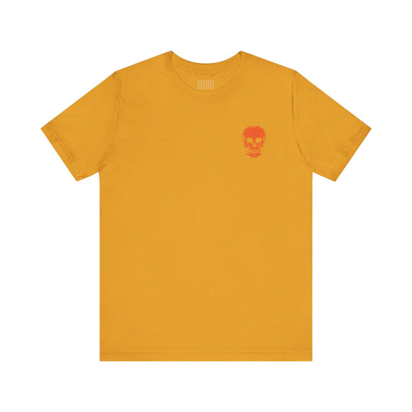 unisex orange skull graphic t-shirt with mini chest print in bright orange on mustard yellow background