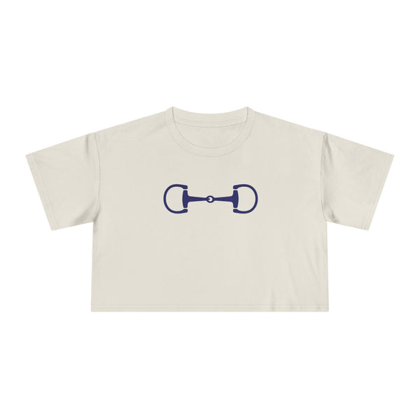 Navy horsebit graphic on a cream cropped tee with relaxed fit and dropped shoulders, blending equestrian and Ivy League style.