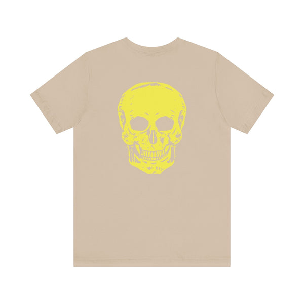 Beige underground style unisex t-shirt with a large yellow skull graphic on the back and a minimalist mini skull print on the front.