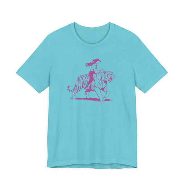 Turquoise unisex tee with neon magenta cowgirl riding tiger graphic on front