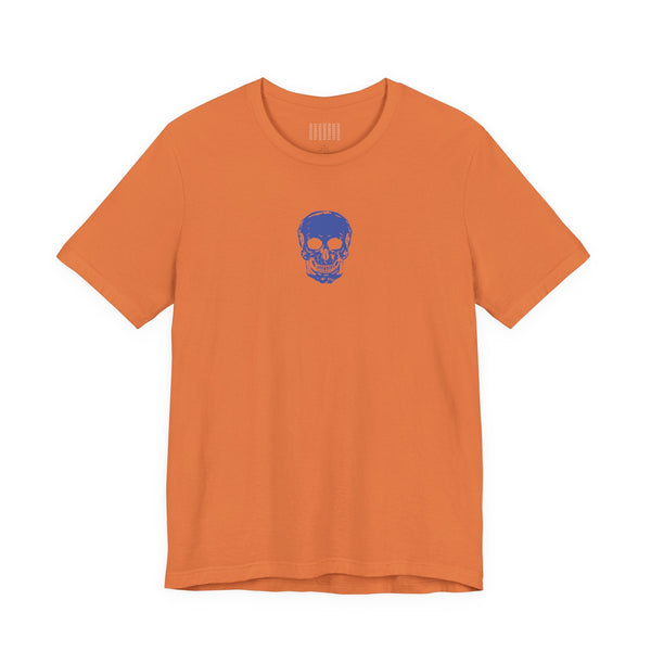 orange graphic t shirt with blue mini skull design on front center below collar