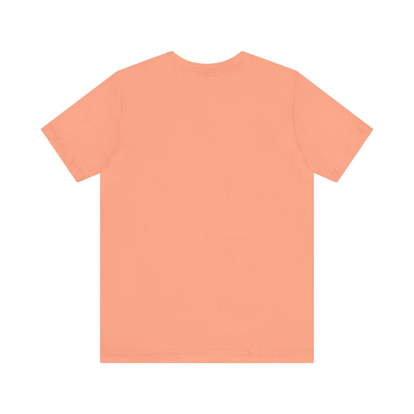 Back view of neon magenta cowgirl graphic t-shirt on peach fabric unisex jersey tee