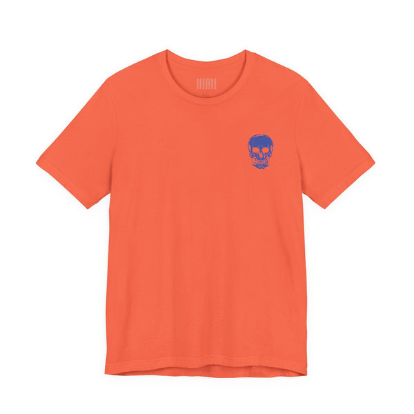 orange unisex rocker tee with small blue skull graphic on front left side
