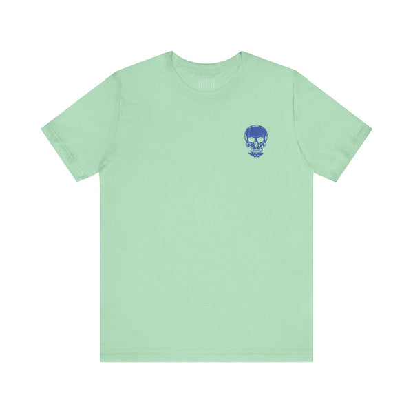 Mint green unisex rocker tee with small blue skull graphic on front left chest