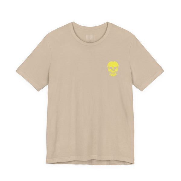 beige underground style t-shirt with small yellow skull print on chest and jumbo yellow skull graphic on back