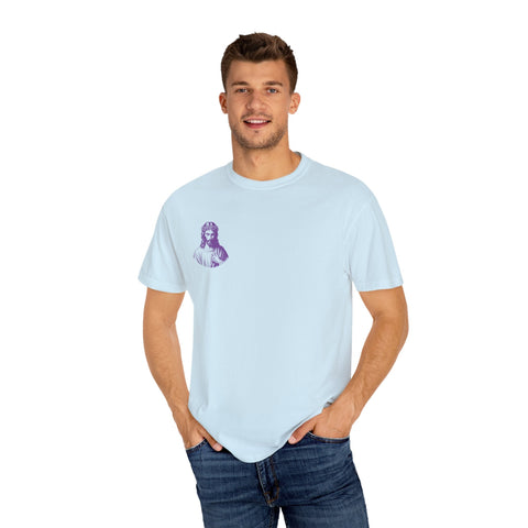 Light blue Christian streetwear tee with a mini purple Jesus graphic on the front left chest, worn by a male model.