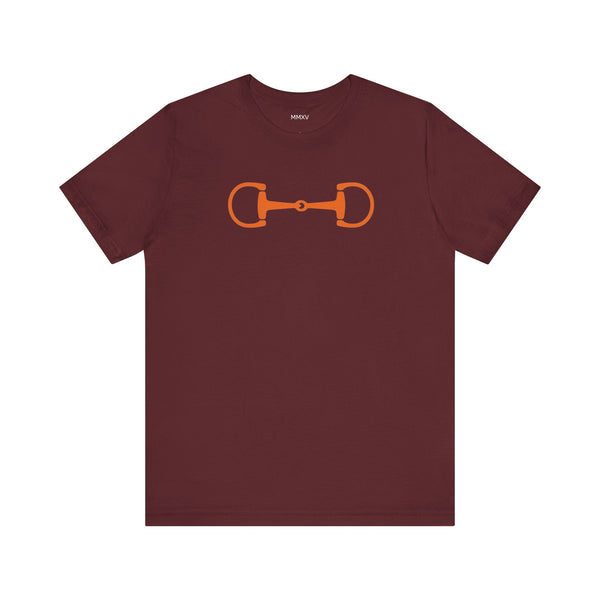Maroon graphic tee with vibrant orange horsebit design, heritage equestrian streetwear style.
