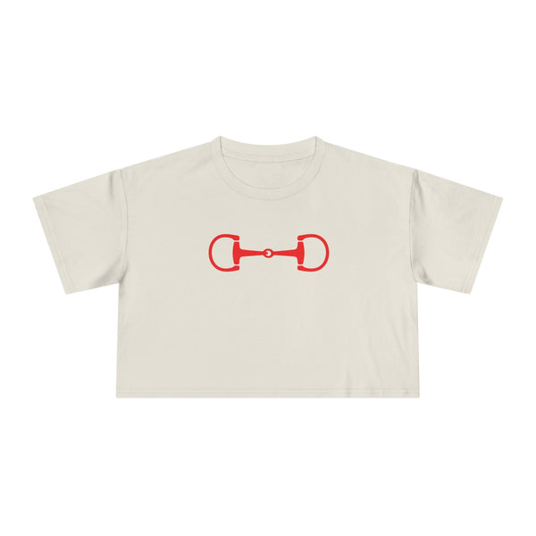 White cropped tee with red horse bit design, relaxed drop-shoulder fit, soft cotton material.