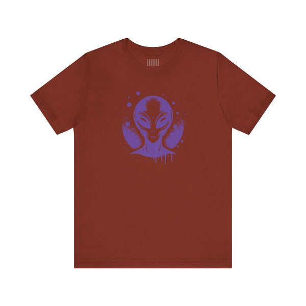 Brown streetwear alien t shirt with a violet graffiti-style alien graphic on the front