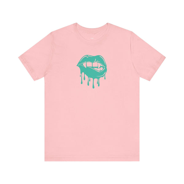 Pink unisex t-shirt featuring a teal vampire lips graphic with dripping effect on the front.