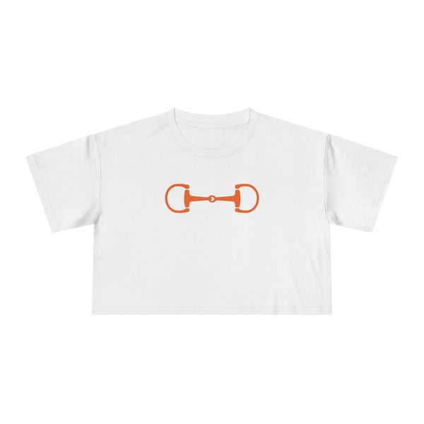 White cropped t-shirt with a bold orange horsebit graphic for equestrian style and horse lovers.