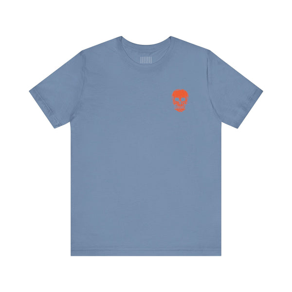 Unisex blue t-shirt with a small orange skull graphic on the left chest, streetwear style