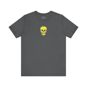 Gray street style t-shirt with a small yellow skull graphic centered on the front.