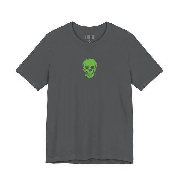 Urban streetwear charcoal gray tee with a mini green skull graphic centered on the chest
