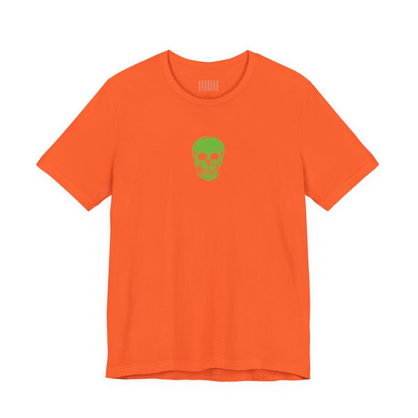 Orange urban streetwear t-shirt with mini green skull graphic centered on chest