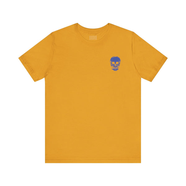 Mustard yellow unisex rocker tee with small blue skull graphic on front left chest.