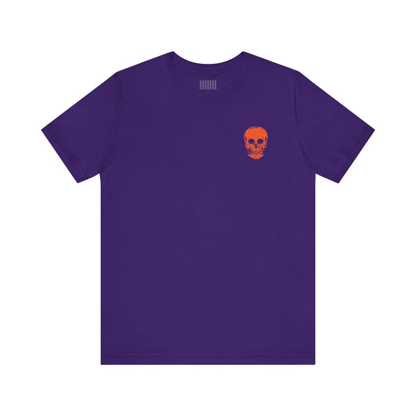 Purple t-shirt with orange mini skull front graphic, featuring jumbo orange skull back print, relaxed unisex fit cool skull shirt