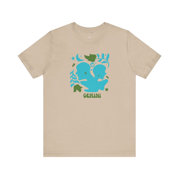 Beige zodiac t shirt with retro blue Gemini twin graphic and green accents, made of breathable cotton.