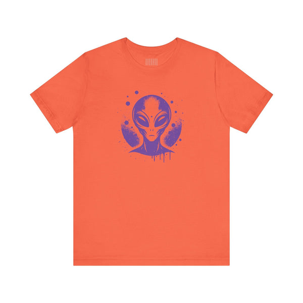 Orange streetwear alien t shirt with purple ET graphic inspired by 1980s sci-fi posters.