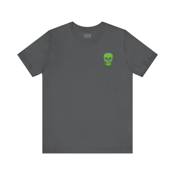 Gray streetwear t shirt with small green skull graphic on chest by Fugitive Sandra Oles