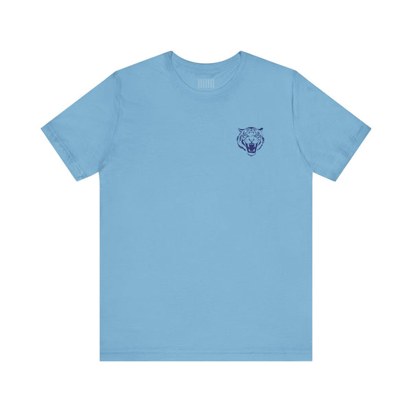 light blue crew neck retro graphic tee with small navy blue roaring tiger head print on left chest
