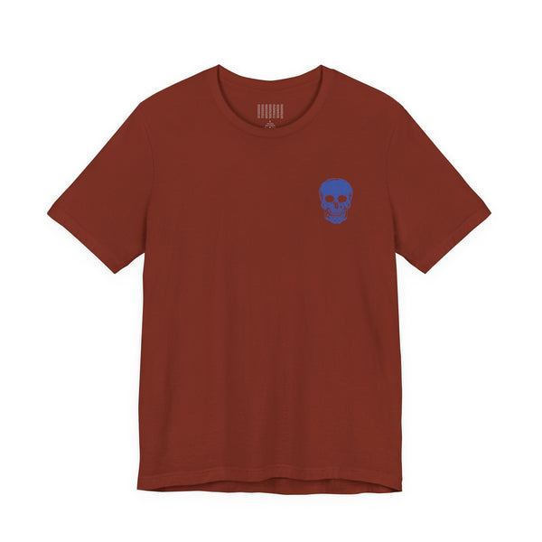 rust red graphic tee shirt with small blue skull on front left side