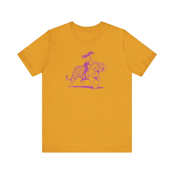 Mustard yellow tee with purple graphic of a cowgirl riding a tiger, retro style cowgirl shirt