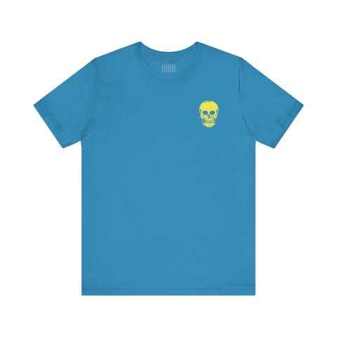 Blue streetwear tee shirt with small yellow mini skull graphic on left chest by Fugitive