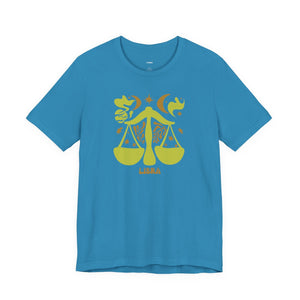 Blue unisex Libra t shirt with yellow balance scales and celestial zodiac design