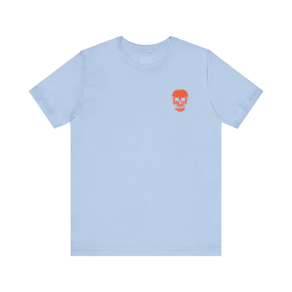 Unisex light blue t-shirt with small orange skull graphic on left chest, streetwear style