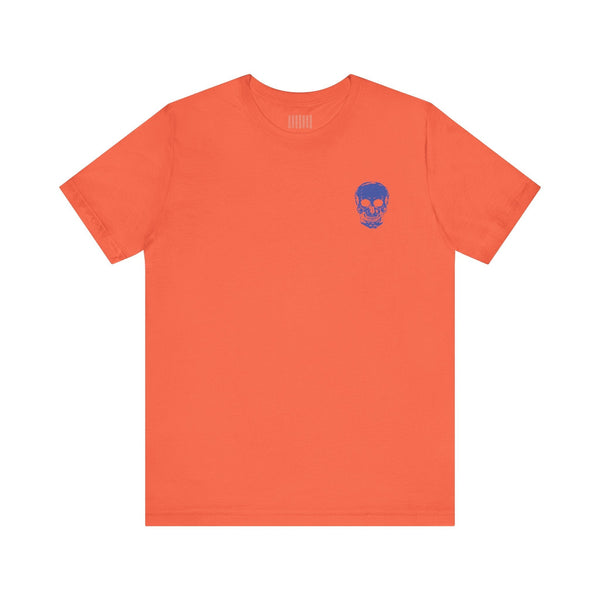 Orange unisex rocker tee with small blue skull graphic on front left chest