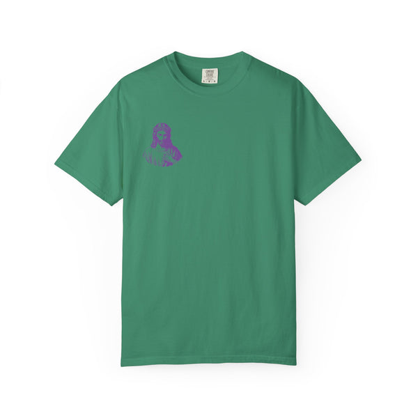 Green t-shirt with small purple Jesus graphic on front left chest, short sleeves and crew neck.