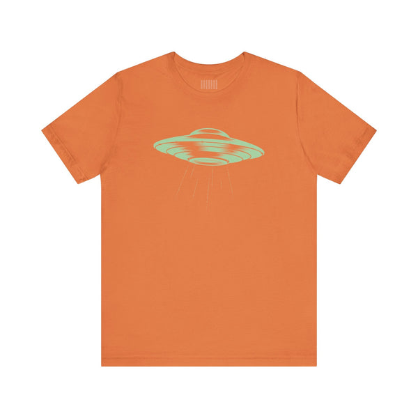 Orange space ship crew neck t shirt with a celadon green retro flying saucer graphic on the front.