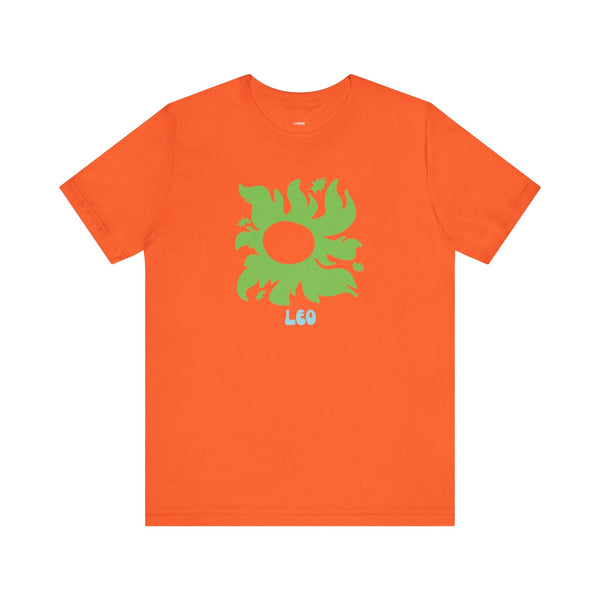 Orange Leo astrology t shirt with green sunburst graphic and star accents, soft cotton, unisex fit.