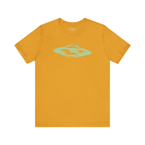 Mustard yellow unisex t-shirt with a celadon green retro flying saucer graphic and beam design.