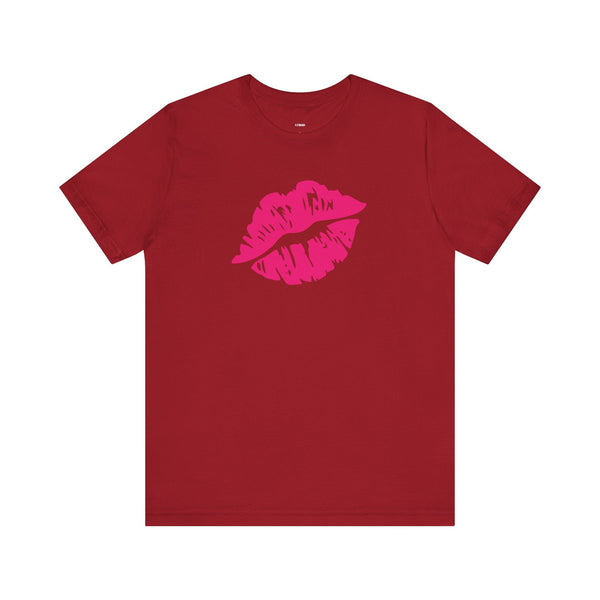 Red unisex tee with bold hot pink lip print graphic on front