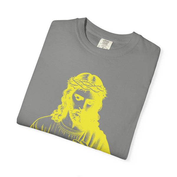 Folded gray t-shirt featuring a yellow jumbo Jesus graphic with a crown of thorns religious design