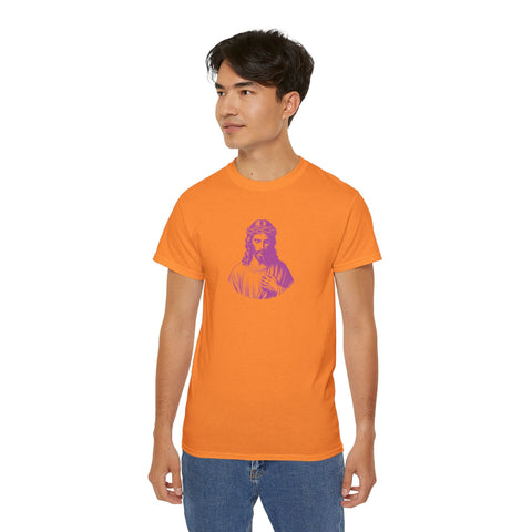 Man wearing orange Jesus T-shirt with purple graphic print and casual jeans