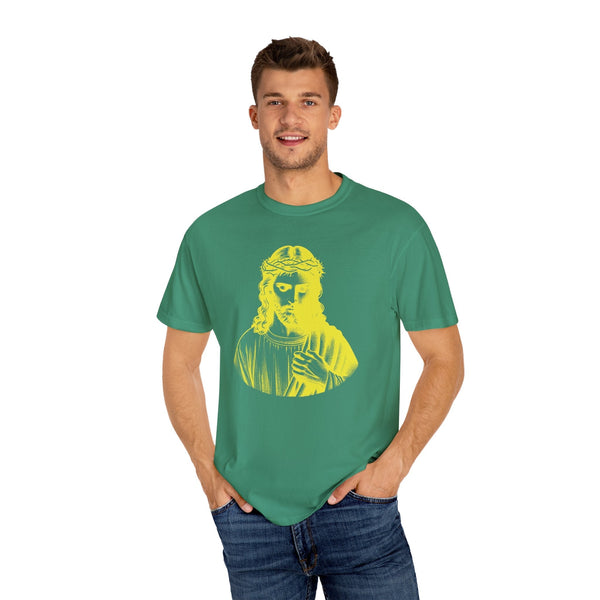 Man wearing green religious graphic tee with yellow Jesus Crown of Thorns print
