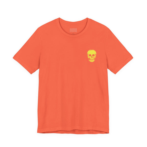 Orange t-shirt with small yellow skull on left chest and bold underground style graphic design