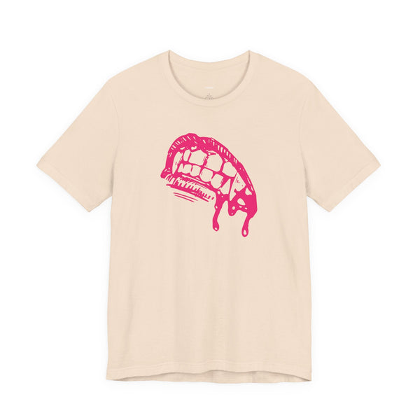 Pink vampire fang graphic tee made of 100% lightweight cotton with a classic crew neckline and retail fit