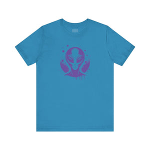 Blue streetwear alien t shirt featuring a purple alien graphic inspired by 1980s sci-fi and street art style.