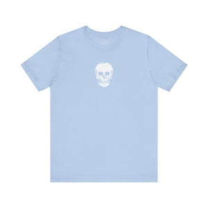 Light blue t shirt with centered small white skull graphic on chest, made from soft cotton.