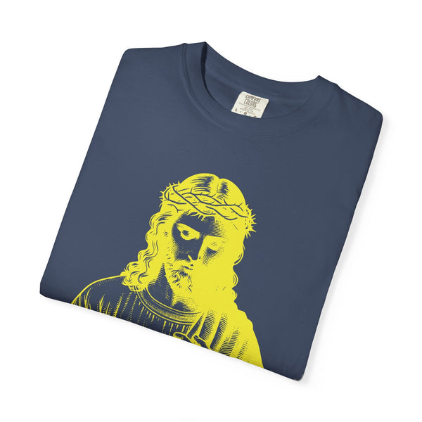 Folded navy blue religious graphic tee with yellow Jesus print wearing crown of thorns