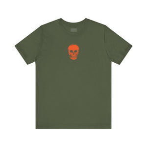Olive green tee with orange mini skull graphic centered on front, breathable cotton fabric, casual edgy style shirt