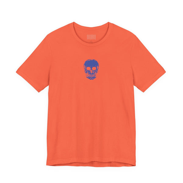 Orange graphic t shirt with blue mini skull design on the front center collar area
