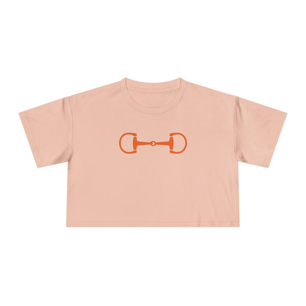 Orange cropped tee with bold horsebit graphic for equestrian style lovers